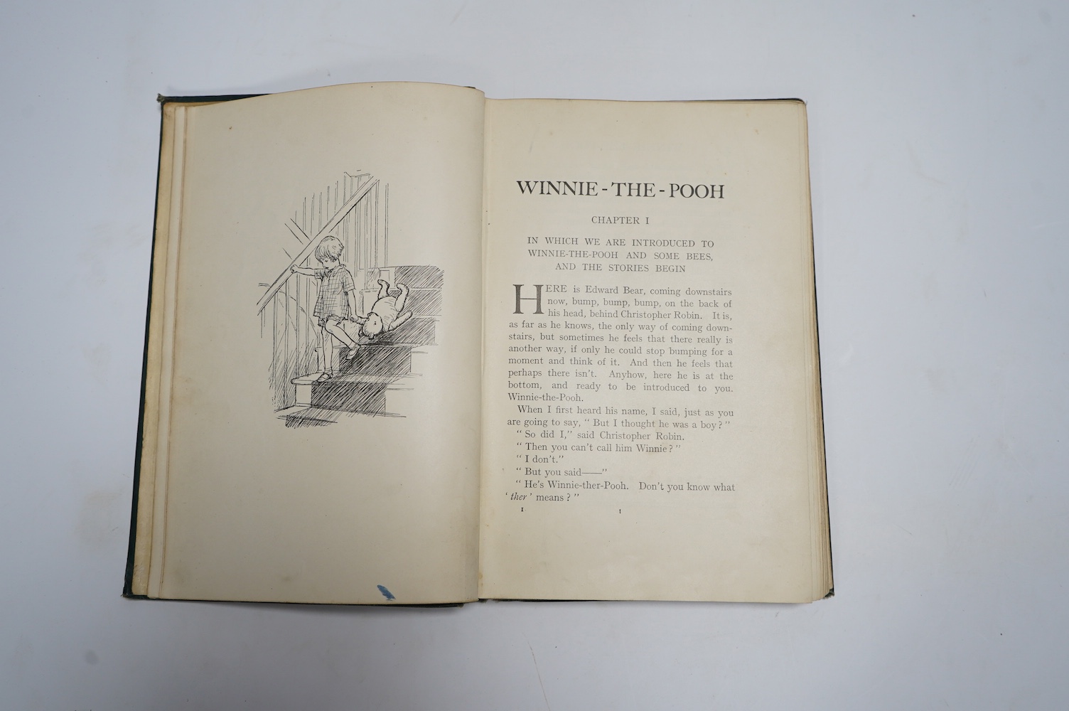 Milne, A.A. – Winnie-The-Pooh, first edition, 8vo, numerous illustrations (by Ernest H. Shepard), pictorial map on e/ps, half-title, original green cloth, pictorial gilt, t.e.g., Methuen & Co., 1926; A.A. Milne – The Hou